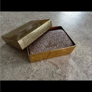 Michael Kors wallet. Rose gold and NWT!